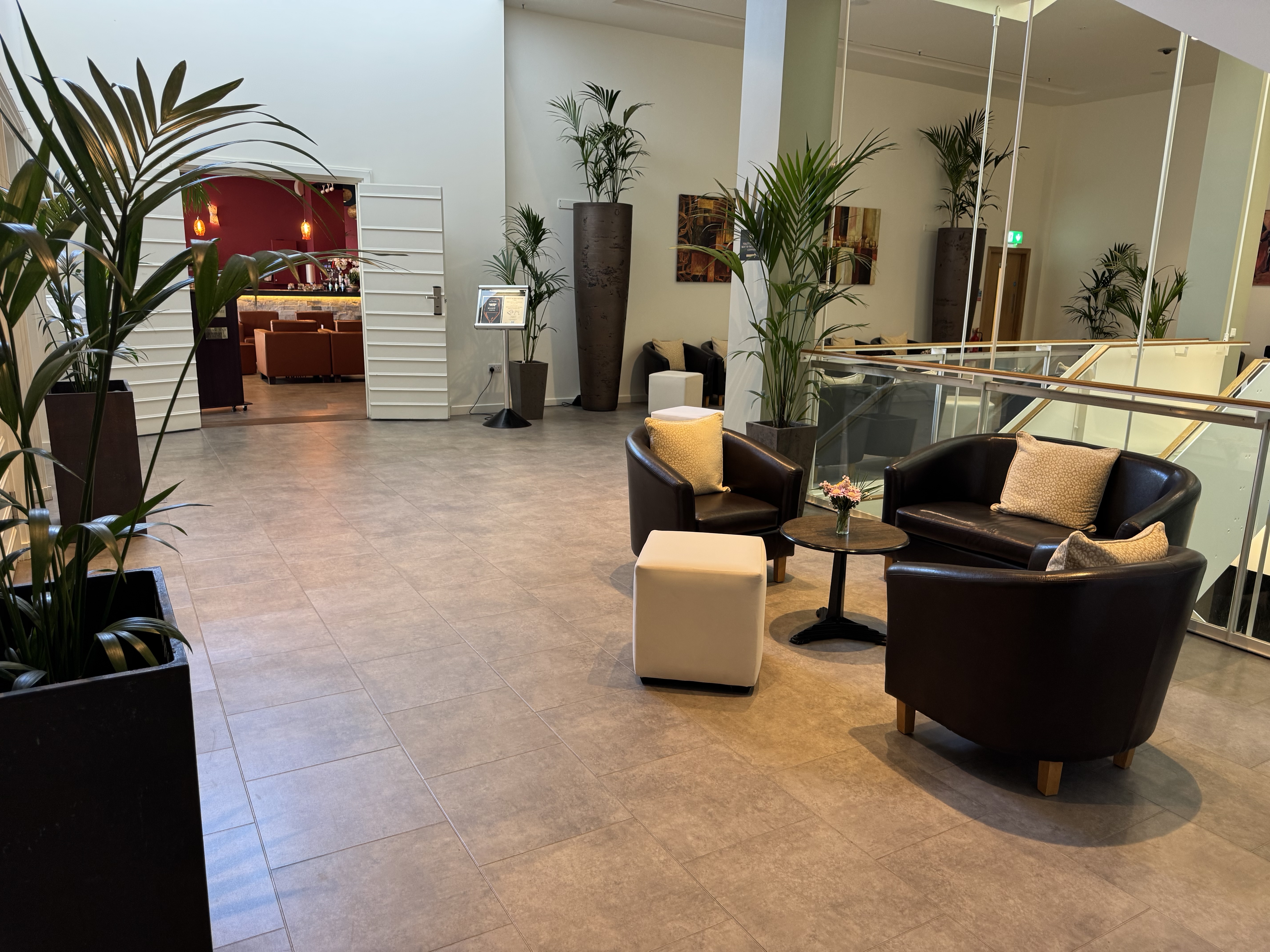 La Terrasse entrance today — the approach to the restaurant from inside the hotel, in its current finish.